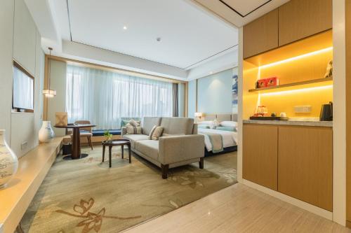 Imagen de la habitación del Hotel Century Runhua. Foto 19