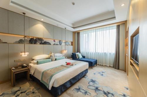 Imagen de la habitación del Hotel Century Runhua. Foto 20