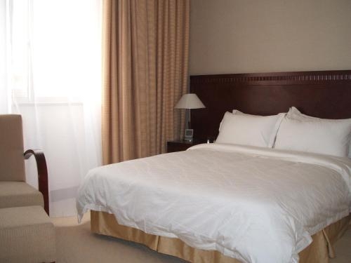 Imagen de la habitación del Hotel Century, Taicang. Foto 9