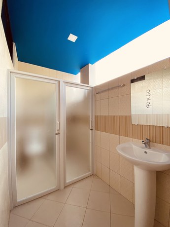 Imagen de la habitación del Hotel Cerca Parola beach resort. Foto 18