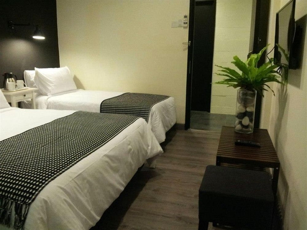 Imagen de la habitación del Hotel Ceria Bukit Bintang. Foto 3