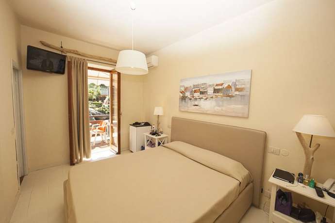 Imagen de la habitación del Hotel Cernia Isola Botanica. Foto 13
