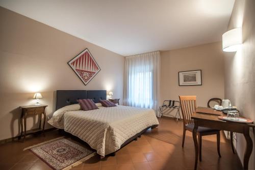 Imagen de la habitación del Hotel Certosa Di Pontignano Residenza D'epoca. Foto 4