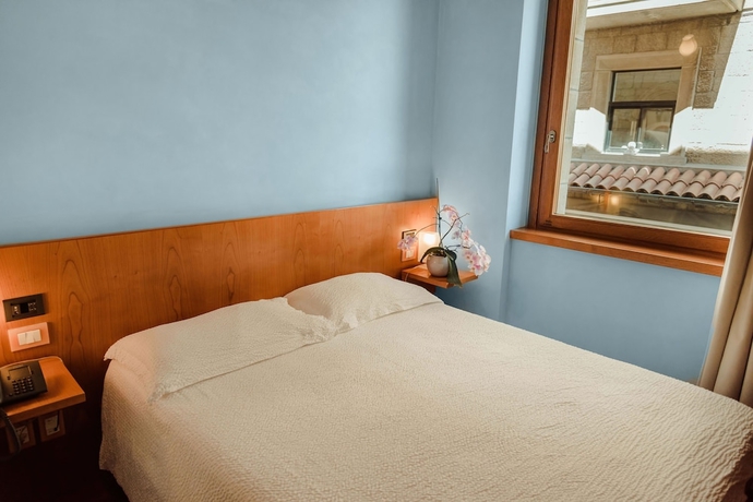 Imagen de la habitación del Hotel Cesare. Foto 13