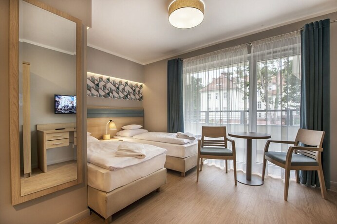 Imagen de la habitación del Hotel Cesarskie Ogrody. Foto 12