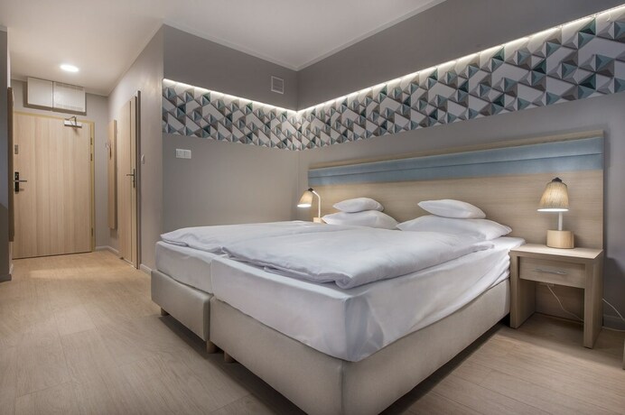 Imagen de la habitación del Hotel Cesarskie Ogrody. Foto 17