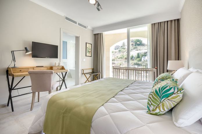 Imagen de la habitación del Hotel Cesca Boutique. Foto 6