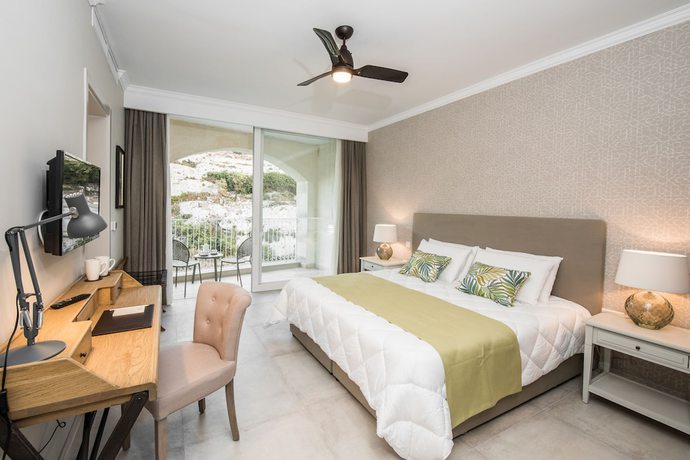 Imagen de la habitación del Hotel Cesca Boutique. Foto 14