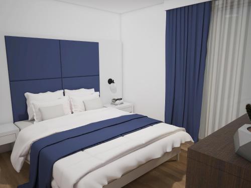 Imagen de la habitación del Hotel C'est La Vie Boutik Swieqi. Foto 10