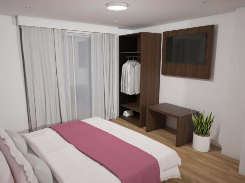 Imagen de la habitación del Hotel C'est La Vie Boutik Swieqi. Foto 15