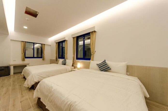 Imagen de la habitación del Hotel C\'est La Vie Villa. Foto 11