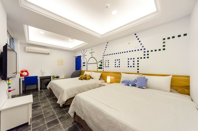 Imagen de la habitación del Hotel C\'est La Vie Villa. Foto 12