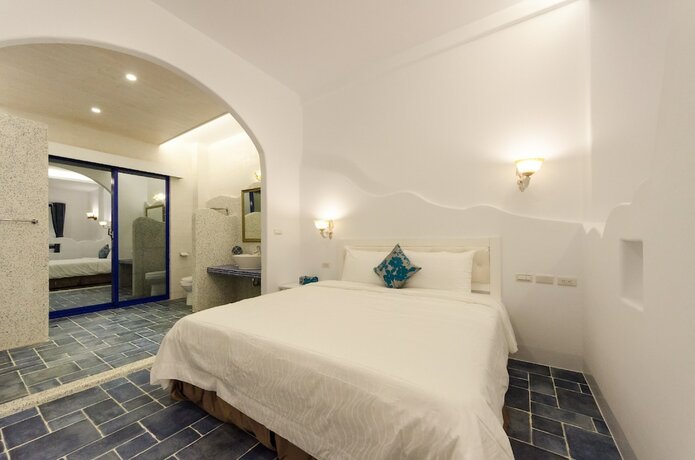 Imagen de la habitación del Hotel C\'est La Vie Villa. Foto 17