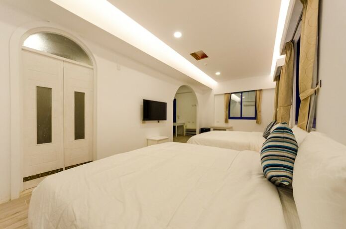 Imagen de la habitación del Hotel C\'est La Vie Villa. Foto 18