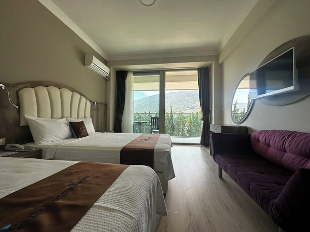 Imagen de la habitación del Hotel Cetin Prestige Resort. Foto 18