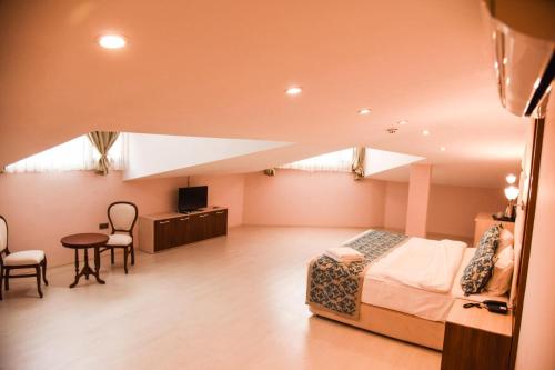 Imagen de la habitación del Hotel Cevaher & Suıtes. Foto 12