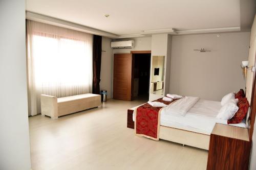 Imagen de la habitación del Hotel Cevaher & Suıtes. Foto 14