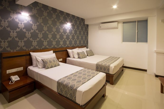 Imagen de la habitación del Hotel Ceyloni City. Foto 3