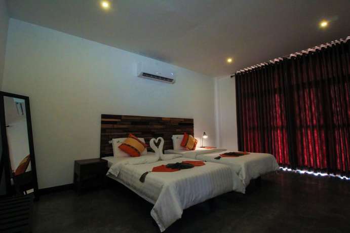 Imagen de la habitación del Hotel Ceyloni hotel. Foto 13