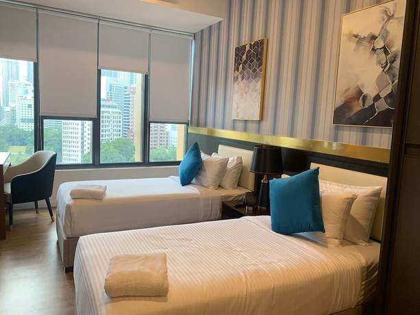 Imagen de la habitación del Hotel Ceylonz Suites by MyKey Global. Foto 6