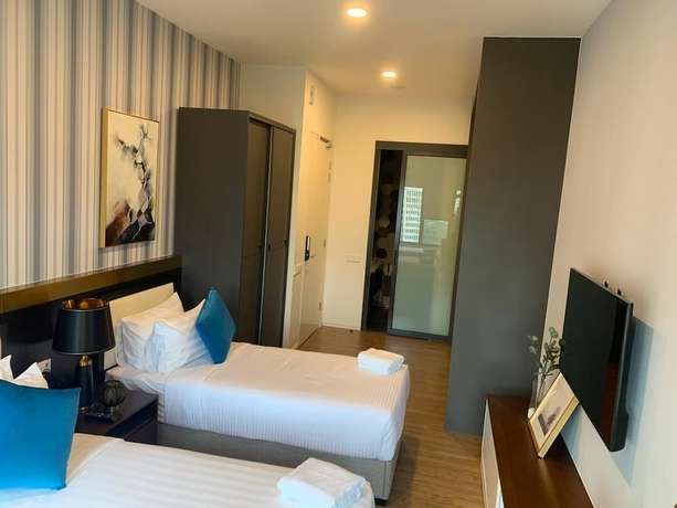 Imagen de la habitación del Hotel Ceylonz Suites by MyKey Global. Foto 11