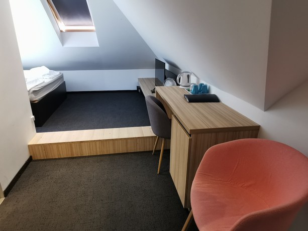 Imagen de la habitación del Hotel Cha Cha Rooms. Foto 1