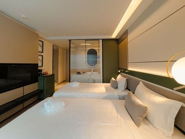 Imagen de la habitación del Hotel Cha Chiangmai Luxury. Foto 22