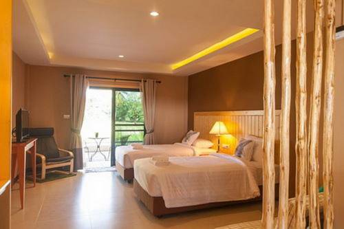 Imagen de la habitación del Hotel Cha-am Country Home. Foto 3