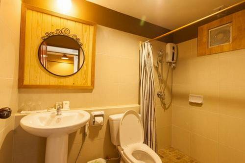Imagen de la habitación del Hotel Cha-am Country Home. Foto 5