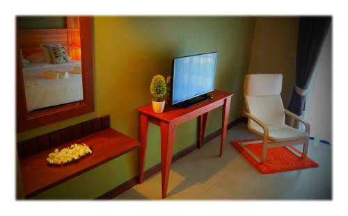 Imagen de la habitación del Hotel Cha-am Country Home. Foto 12
