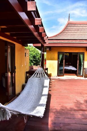 Imagen de la habitación del Hotel Chaan Mai Hom. Foto 17