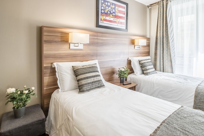 Imagen de la habitación del Hotel Chabrol Opéra. Foto 8