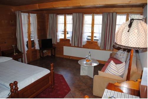 Imagen de la habitación del Hotel Ch&acirc;let Du Lac. Foto 16