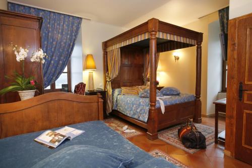 Imagen de la habitación del Hotel Ch&acirc;teau Chapeau Cornu. Foto 8