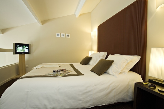 Imagen de la habitación del Hotel Château De Pizay. Foto 4