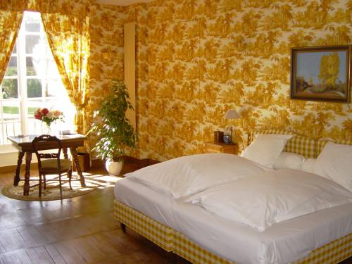 Imagen de la habitación del Hotel Ch&acirc;teau De Vault De Lugny. Foto 12