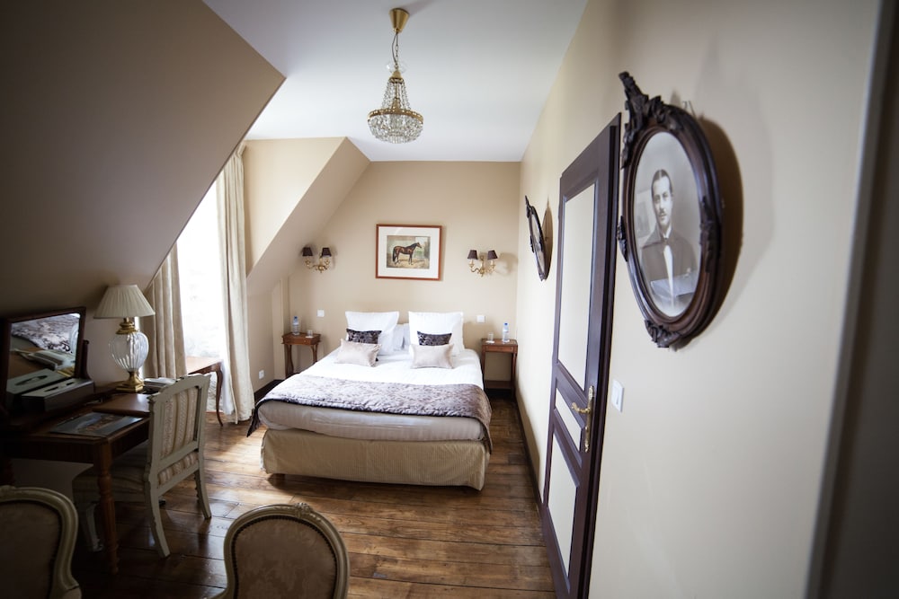 Imagen de la habitación del Hotel Château Du Colombier. Foto 8
