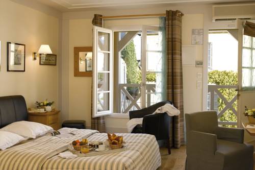 Imagen de la habitación del Hotel Château La Chenevière. Foto 3