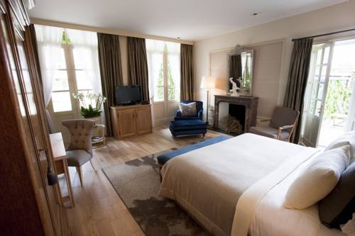 Imagen de la habitación del Hotel Château La Chenevière. Foto 8