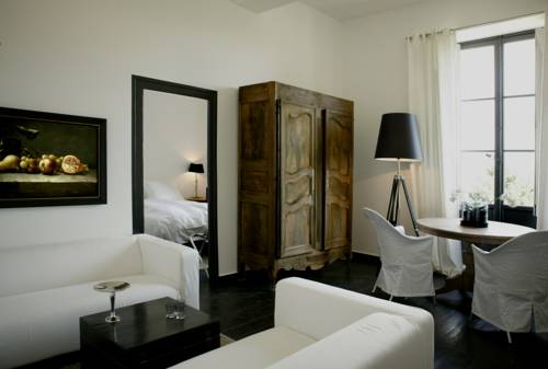 Imagen de la habitación del Hotel Château Les Merles. Foto 10