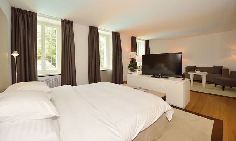 Imagen de la habitación del Hotel Château de Bonmont. Foto 17