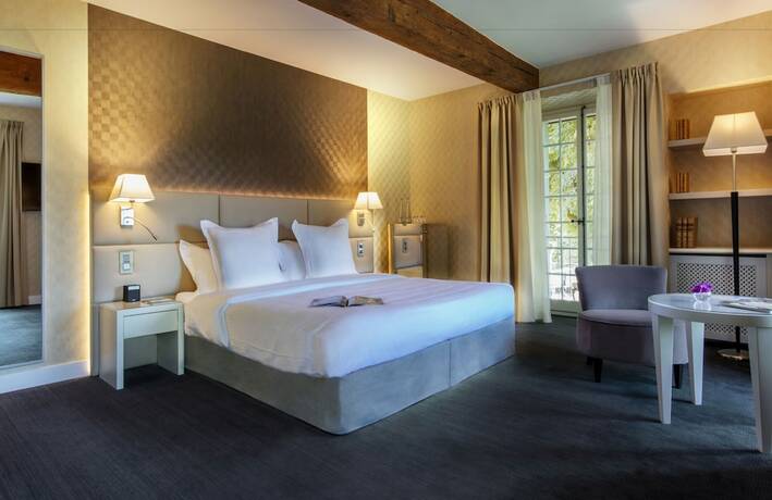 Imagen de la habitación del Hotel Château de Bonmont. Foto 18