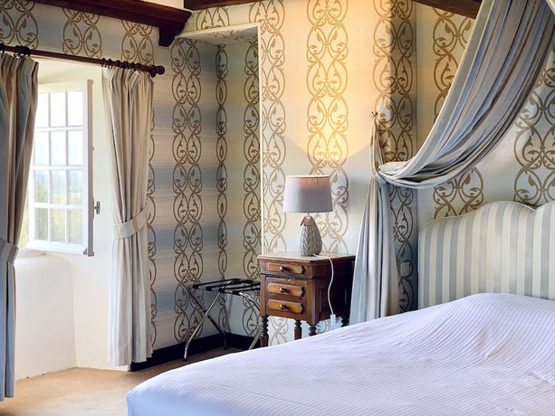 Imagen de la habitación del Hotel Château de la Roque. Foto 5