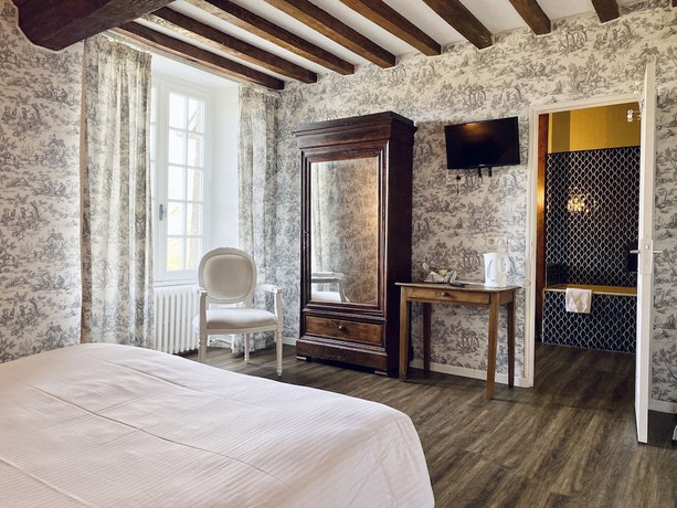 Imagen de la habitación del Hotel Château de la Roque. Foto 7