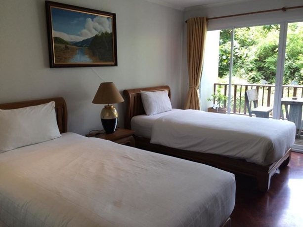 Imagen de la habitación del Hotel Chada Thai House. Foto 11