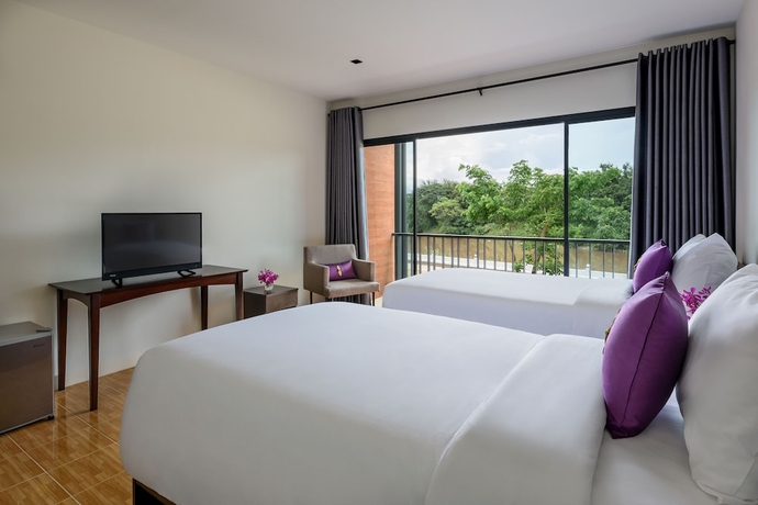 Imagen de la habitación del Hotel Chainarai Riverside. Foto 3