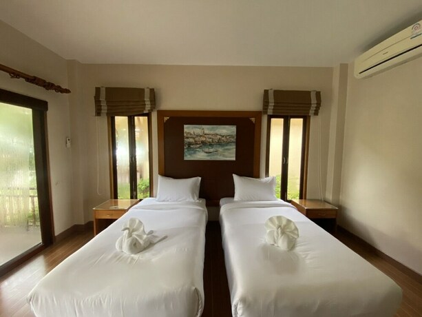 Imagen de la habitación del Hotel Chaithalay Khanom Resort. Foto 19