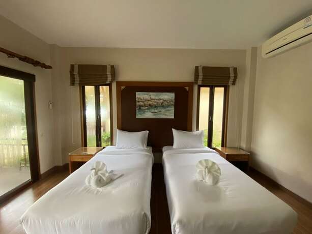 Imagen de la habitación del Hotel Chaithalay Khanom Resort. Foto 35