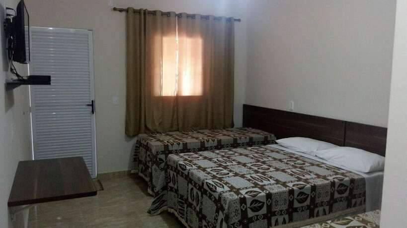 Imagen de la habitación del Hotel Chal&eacute;s Pousada Encantos da Serra. Foto 17