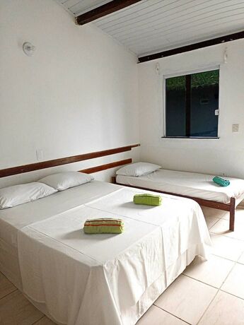 Imagen de la habitación del Hotel Chalés Suítes Pé na Areia - Praia de Guaibim - Bahia. Foto 19